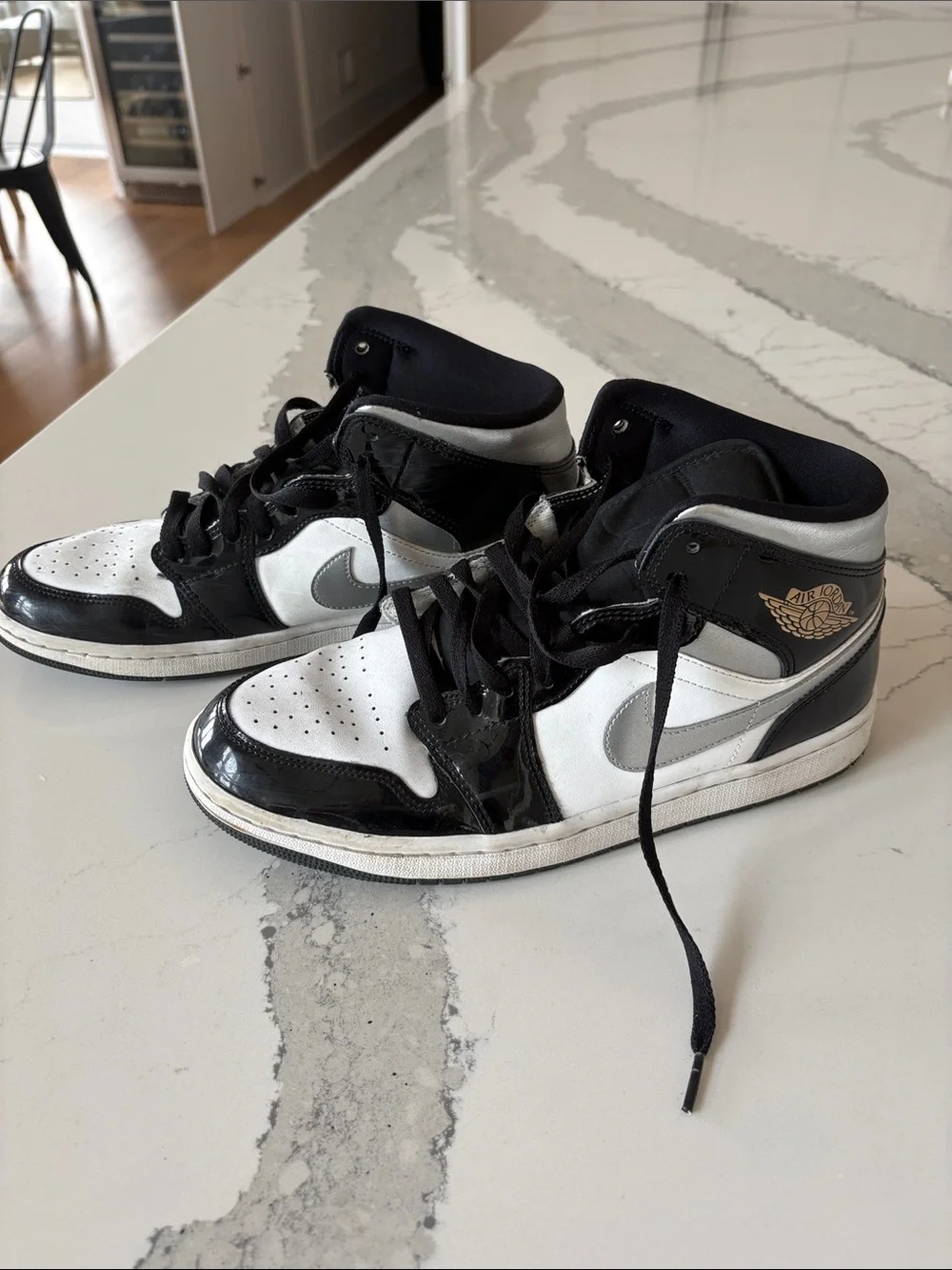 Like new Nike Black patent, silver and White Mid AirJordan